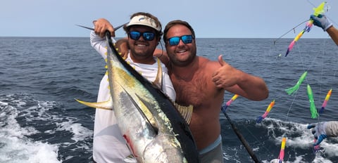 Two anglers with a fish