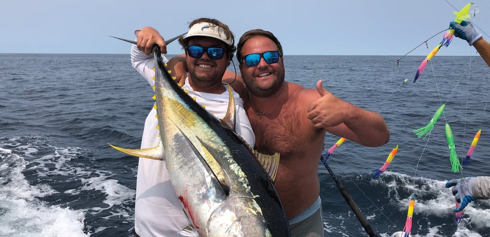 Two anglers with a fish